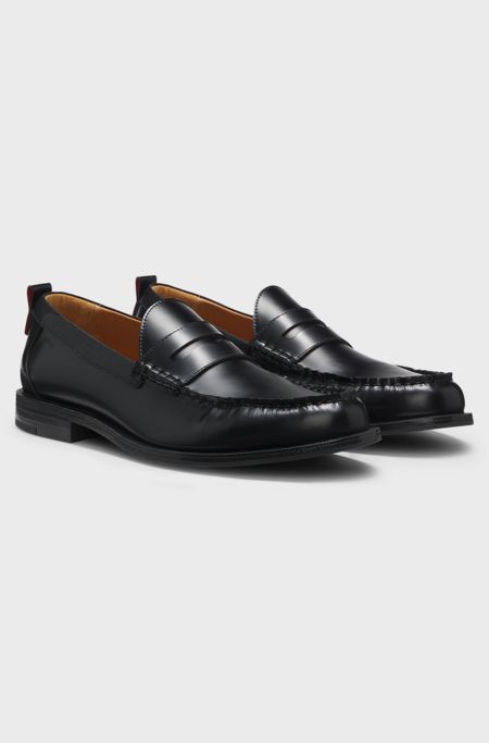 Penny loafers in brush-off leather, Black
