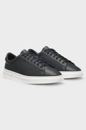 Cupsole trainers in leather with signature-stripe stitching, Black