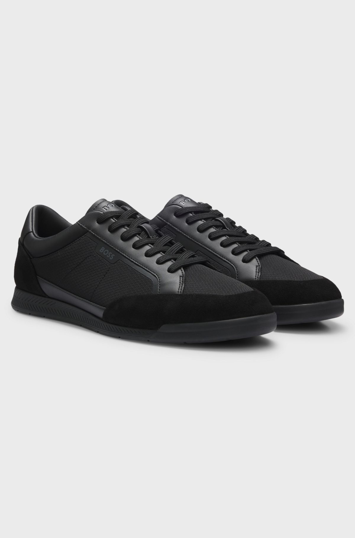 Mixed-material trainers with stitched detailing, Black
