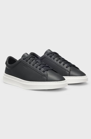 Cupsole trainers in leather with signature-stripe stitching, Black