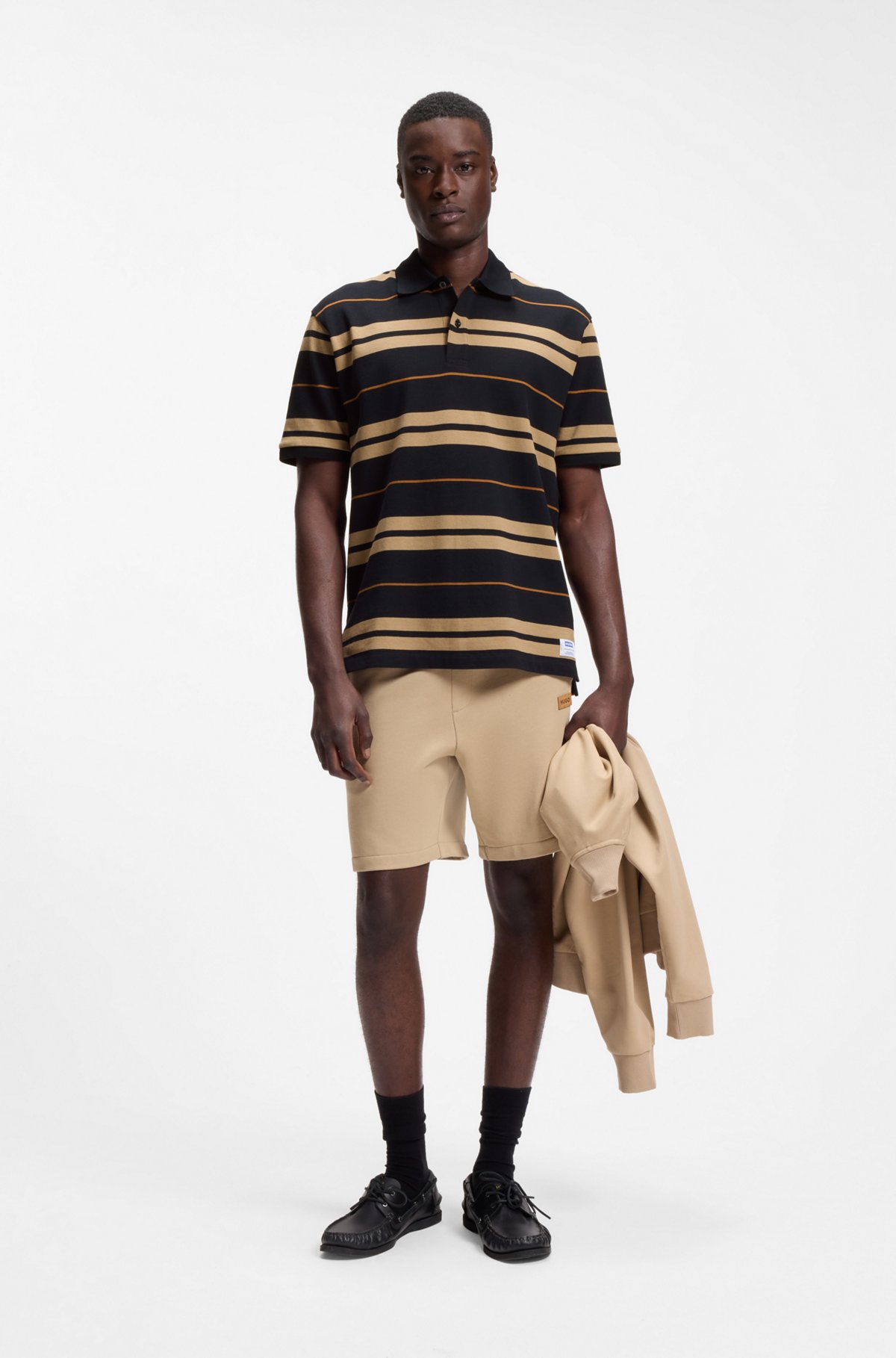 Regular-fit polo in cotton piqué with engineered stripes, Blue / Beige