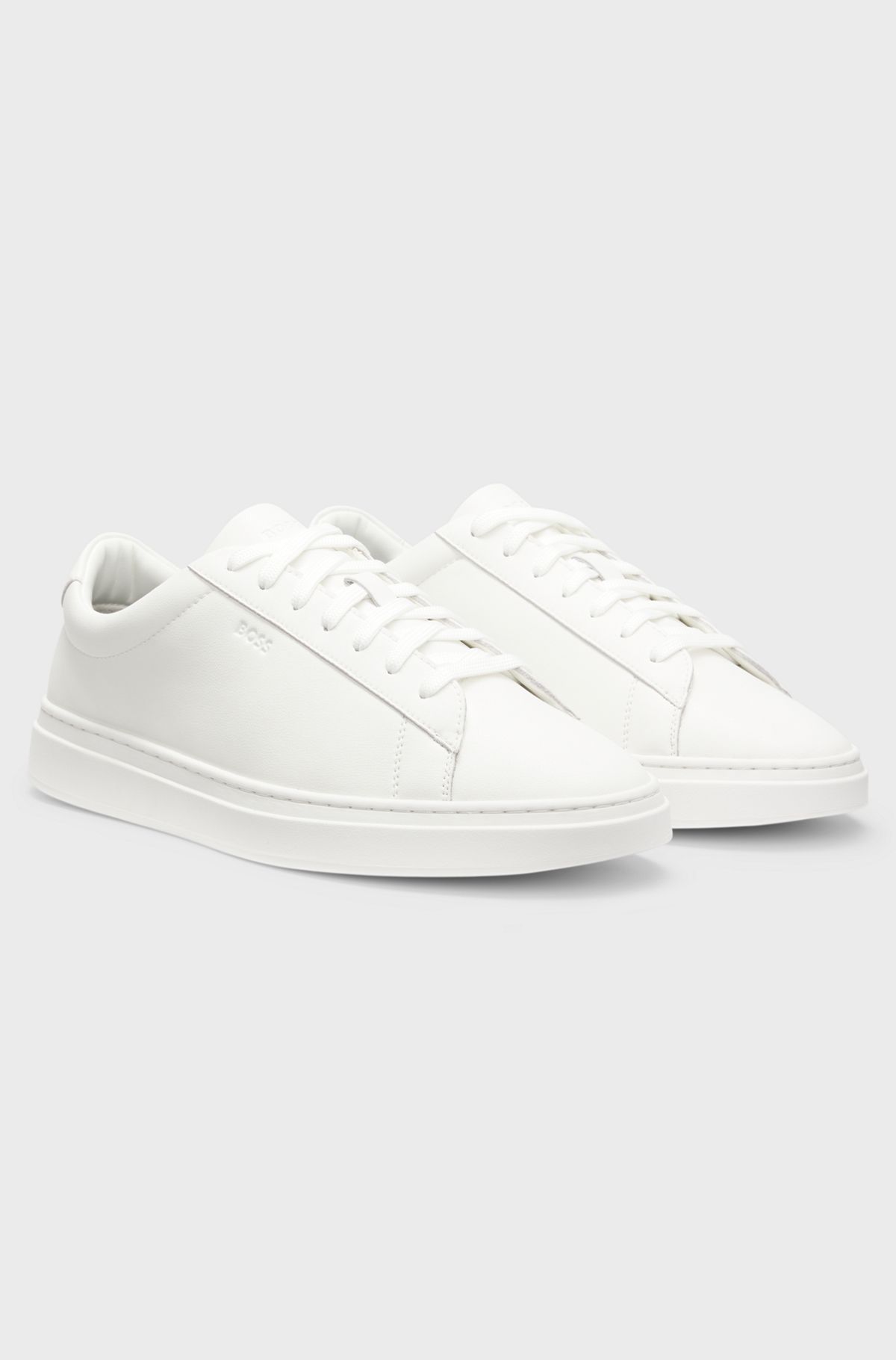 Cupsole trainers in leather with signature-stripe stitching, White