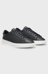 Cupsole trainers in leather with signature-stripe stitching, Black