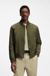 Water-repellent jacket with monogram-pattern sleeves, Dark Green