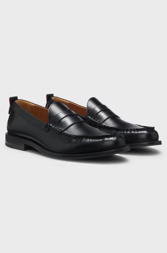 Penny loafers in brush-off leather, Black
